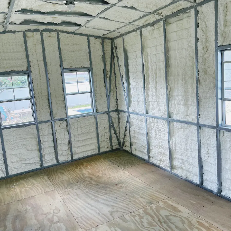 Closed-cell spray foam insulation applied to wall cavities in a residential project in Seabrook